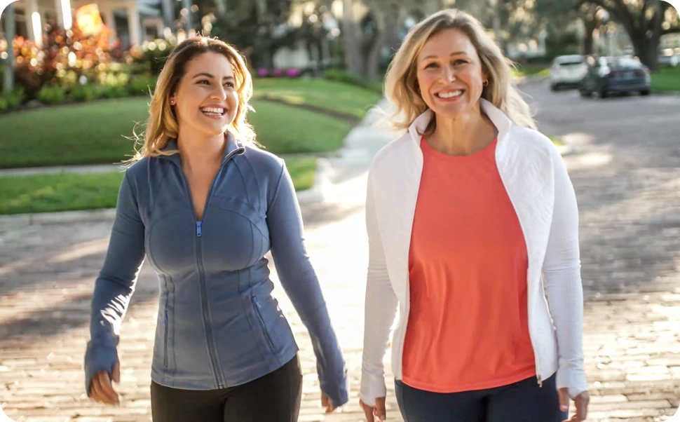 Women walking and laughing